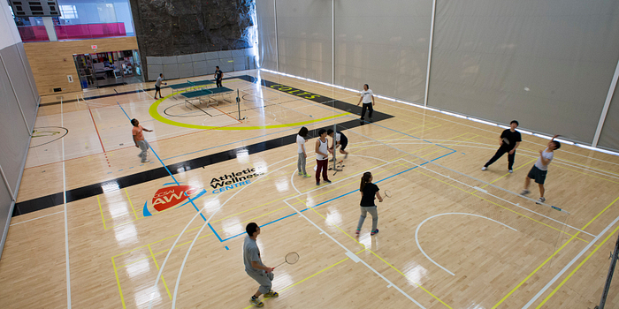 Centennial College students playing badminton and table tennis at the CCSAI and Athletic and Wellness Centre Fitness Festival